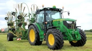 Raking grass with a New John Deere 6125R  Krone Swadro 1400 Plus [upl. by Nannek]