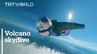 Wingsuit daredevil flies in and out of active volcano [upl. by Airetnohs]