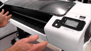 HP Designjet T1300 printer  how to load rolls of media [upl. by Sidon]