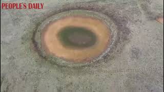 A round pond resembling a wideopen eye sits over 3800 meters in Chinas Sichuan [upl. by Gibson456]