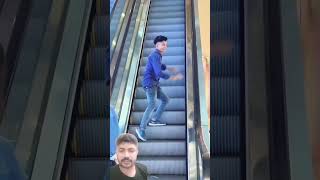 slap prank on Escalator shortsshortsfeed funny funnyprank Mr beasz fun [upl. by Adlen]