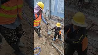 Pouring concrete of fence footing by women team [upl. by Dart]