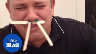 Hilarious moment man struggles to wax his nose  Daily Mail [upl. by Peugia]