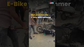 Man smashes Ola EBike with hammer infront of showroom in Delhi  India News [upl. by Clementas]