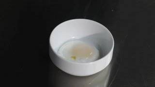 How to Poach an Egg Without a Poacher  Cooking Tips [upl. by Katinka]