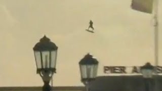 Two kite surfers jump over pier [upl. by Akemal]