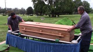 Casket Lowering in a Conventional Cemetery Burial [upl. by Einitsed929]