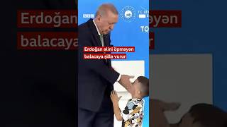 Erdoğan əlini öpməyən balacaya şillə vurur [upl. by Akemal20]