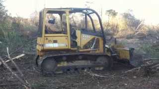 David clearing land using JD 450H Dozer [upl. by Beulah565]