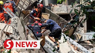 Taiwanese reel from devastating 72 magnitude quake [upl. by Hackney]