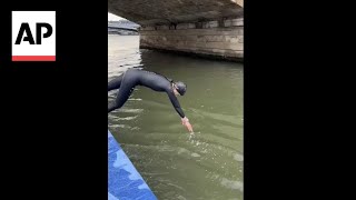 French minister takes plunge into Seine river ahead of Paris 2024 Olympics [upl. by Drexler]