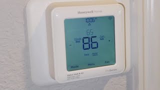 Honeywell Proseries Thermostat Battery Replacement [upl. by Lilias660]