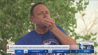 Joey Chestnut outeats four Fort Bliss soldiers in hot dog eating contest in El Paso [upl. by Lasko]