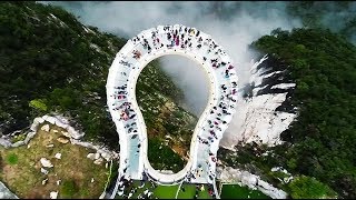 Terrifying glass skywalk in China offers breathtaking special effects [upl. by Aisad941]