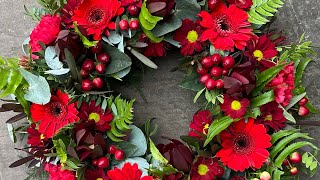 Creating a floral tribute wreath in shades of red and green [upl. by Elene]