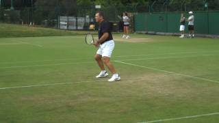 Wimbledon 2009  Roger Federer hitting twohanded backhands next to Johan Kriek amp Kevin Curren [upl. by Mohr]