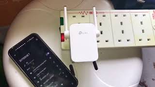 How to Factory Reset TPLink AC1200 WiFi Extender [upl. by Ahseiuqal138]