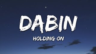 Dabin  Holding On Lyrics ft Lowell [upl. by Aztilem769]