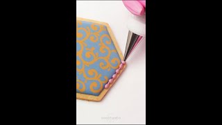 Decorating a cookie with royal icing [upl. by Otrevire]