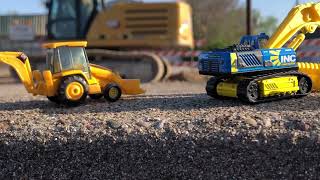 Construction toys  Hot wheels Matchbox and NORSCOT CAT 966G Wheel Loader at construction site￼ [upl. by Mccreery438]