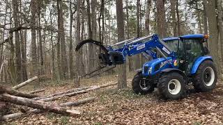 Fork  Grapple New Holland T4 75 S 4WD Workmaster in the Forest 2 [upl. by Samaj642]