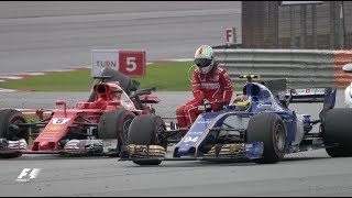 Vettel Hitches A Lift After Crash  2017 Malaysian Grand Prix [upl. by Doehne]