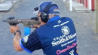 Champion shooter Jerry Miculek shooting full auto M4 rifle Crimson Trace Midnight 3gun [upl. by Body]