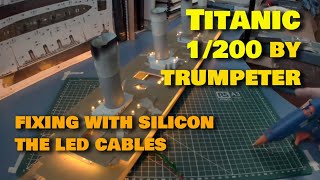 Titanic 1200 Trumpeter fixing with silicon the LED cables [upl. by Adella703]