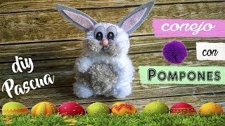 Cómo hacer un CONEJO de PASCUA con pompones de lana [upl. by Ahsienel]