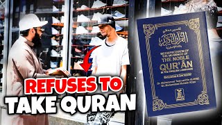 Street man refuses to take Quran from sheikh  Uthman Ibn Farooq Official [upl. by Ahsinyt]