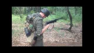 HD WWII German Soldier Firing MP40 Full Auto Shoot  WWII Reenactor Living History [upl. by Assylem]