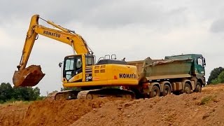 Komatsu PC 240LC and Man TGA [upl. by Kindig8]