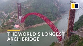 China built world’s longest arch bridge [upl. by Ellerrad]