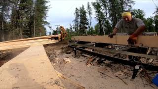 Bozman Portable sawmill canada Lac StJean Horizontal Band saw mill [upl. by Yeknarf]