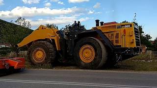 Unloading The Huge Komatsu WA900 Wheel Loader [upl. by Bonnes]