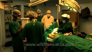 Surgeons preparing for Fibrocystic breast surgery [upl. by Yraeht]