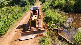 Perfect Action Clearing on flooded road backfilling by skillful dozer amp truck unloading soils [upl. by Aissenav]