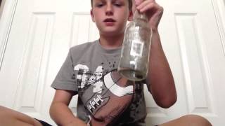 How to do the coin through glass bottle magic trick [upl. by Ashton]