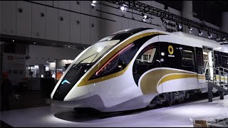 GLOBALink  Chinas CRRC unveils Sanxingduithemed selfdriving train [upl. by Lednew852]