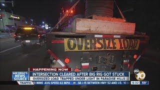 Crews clear Paradise Hills intersection after big rig takes down traffic light [upl. by Enyar]