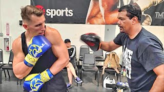 Polish fitness influencer learns the shoulder roll inside the Mayweather Boxing Club [upl. by Tuinenga]