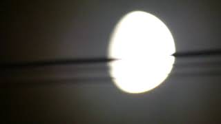 Zoom on the Moon through some cables [upl. by Godwin]