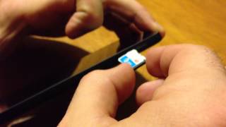 Nexus 5  HOW TO Insert  Remove a SIM Card [upl. by Darrick520]