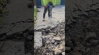 The concrete driveway is extra thin It still has some strength to itconstruction demo concrete [upl. by Alleuol]