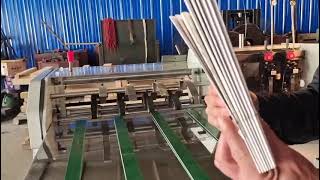 semi autotmatic saddle wire booklet binding  booklet stitching machine [upl. by Laehcym]