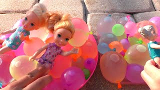 Water balloons Elsa amp Anna toddlers  pool  water fun  floaties [upl. by Anirtac962]