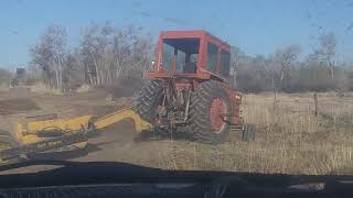 Massey 1100 and eversman scraper rebuilding road [upl. by Behnken]