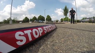 Law enforcement officers practice their Stop Stick skills [upl. by Llerod]