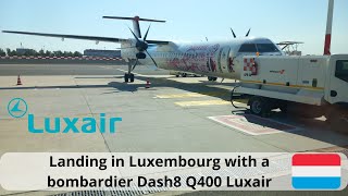 Landing Landing in Luxembourg Luxair DH8D Economy Class [upl. by Janelle663]