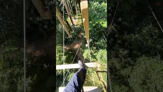 Man crosses rotating steps on high bridge in Foshan China [upl. by Cioffred]